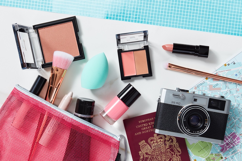 Flat lay of holiday makeup kit